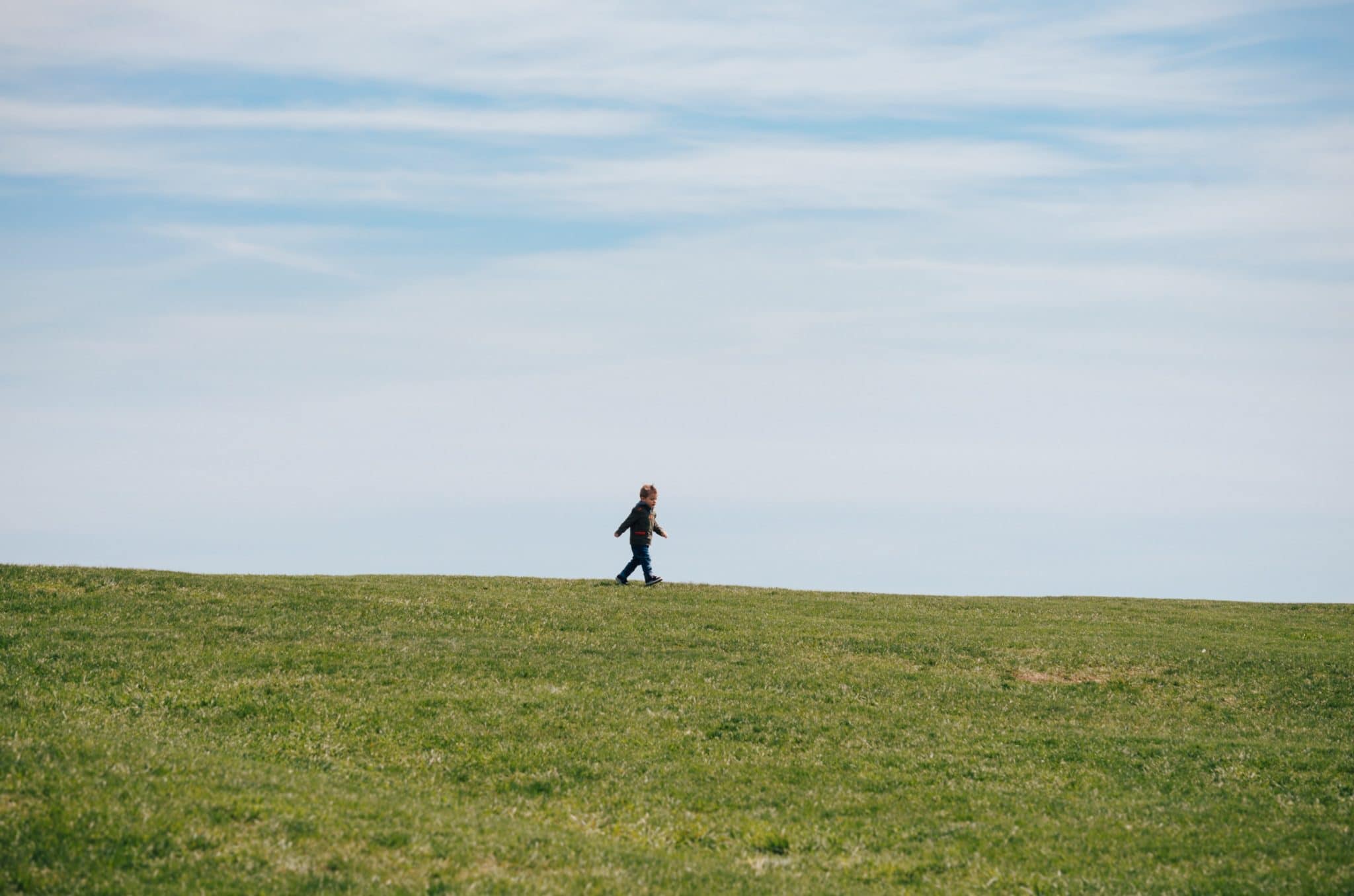 child walking outside