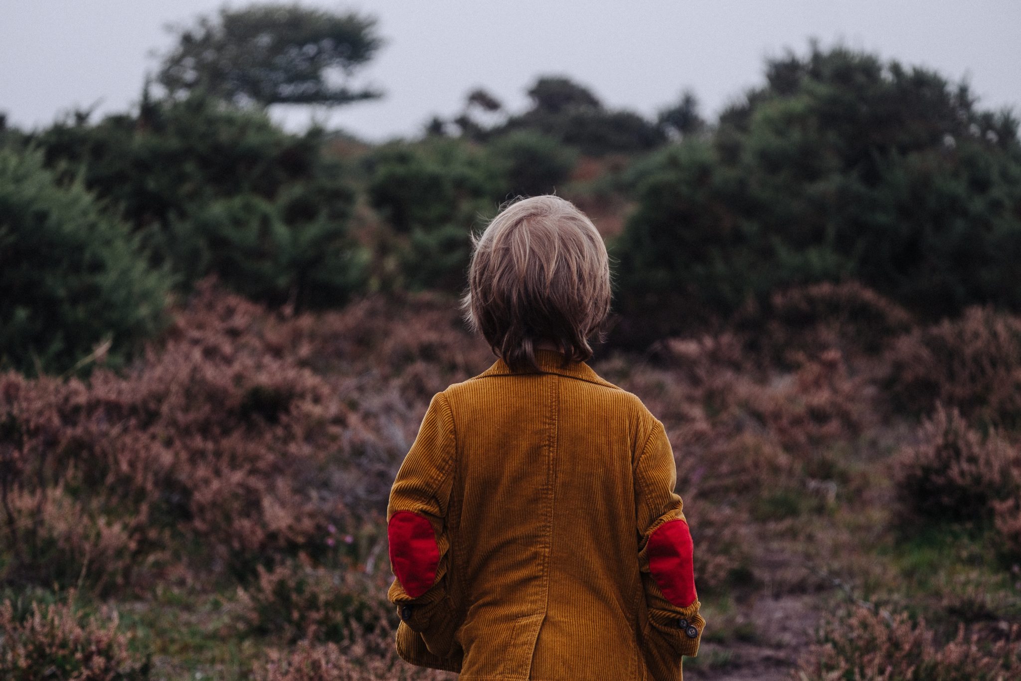 boy standing outside