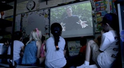 children watching explorer classroom