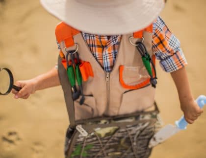 child exploring outdoors