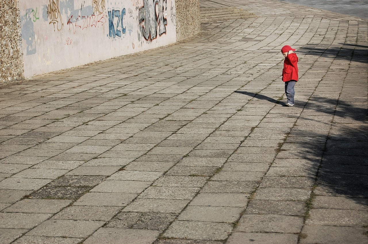 child in a city