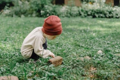 child exploring nature